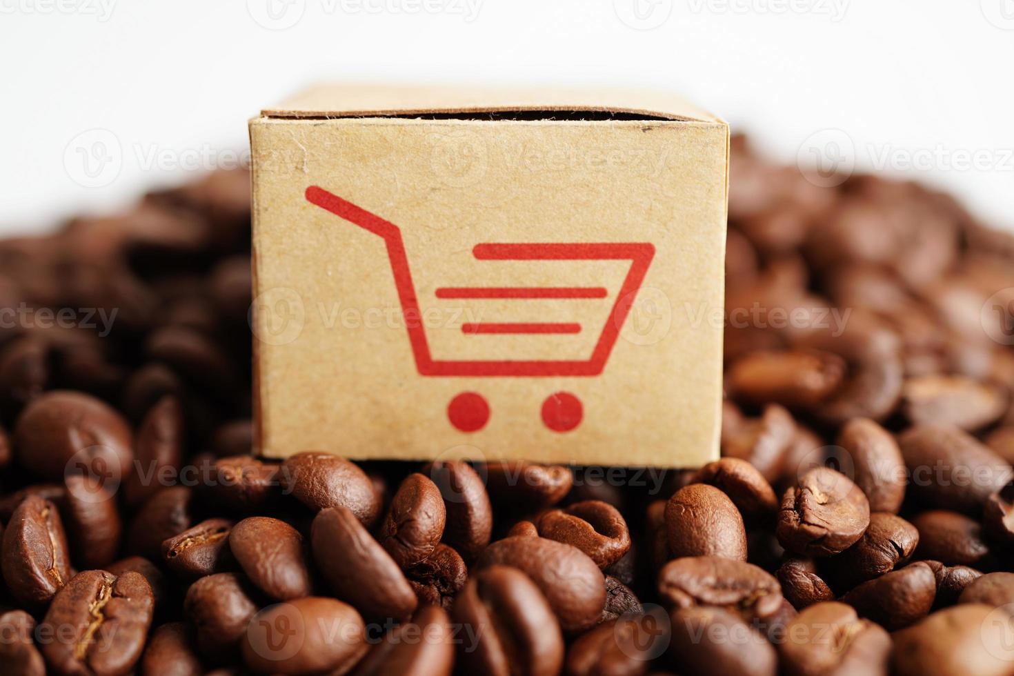 Shopping cart box on coffee beans, shopping online for export or import. photo