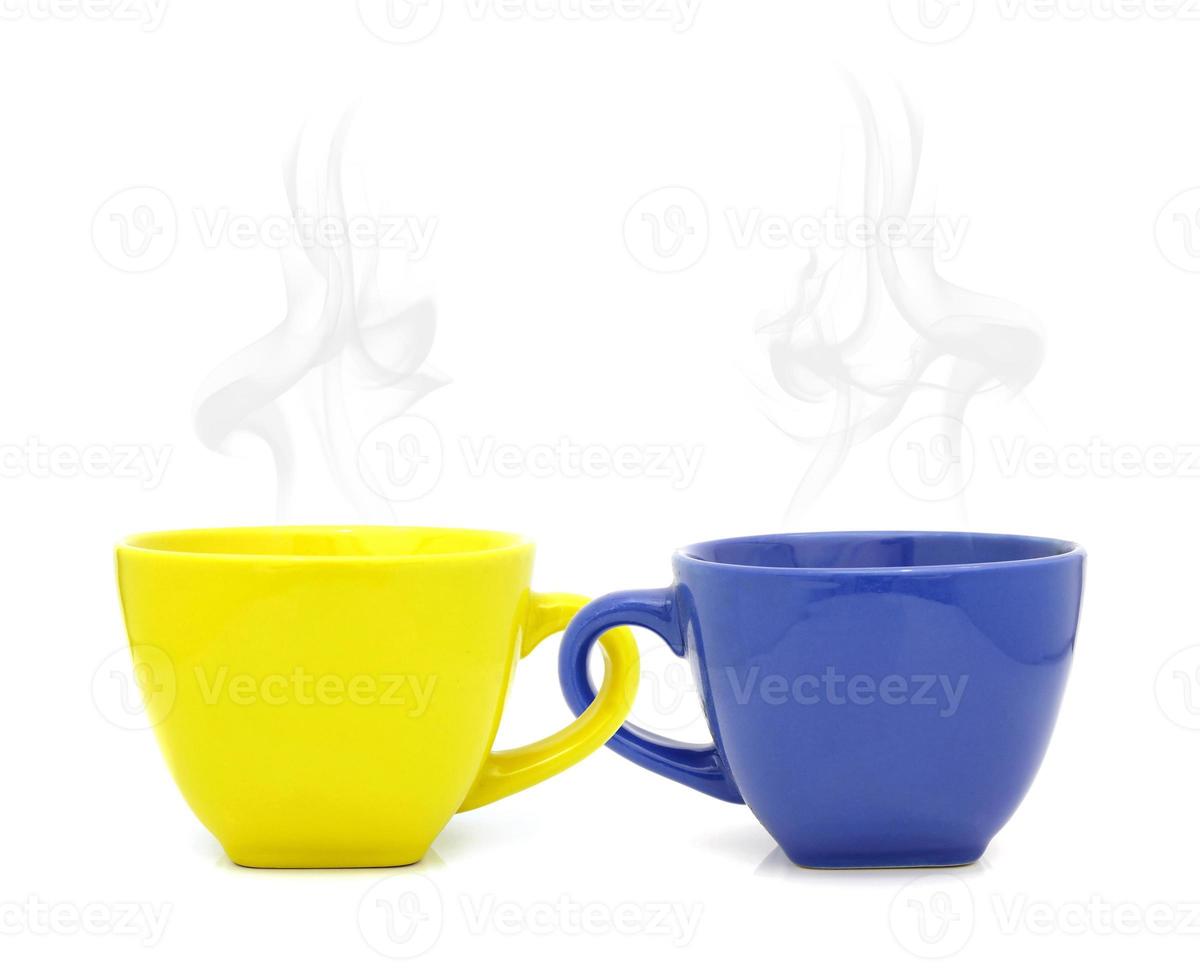 Color cup with hot drink on white background photo