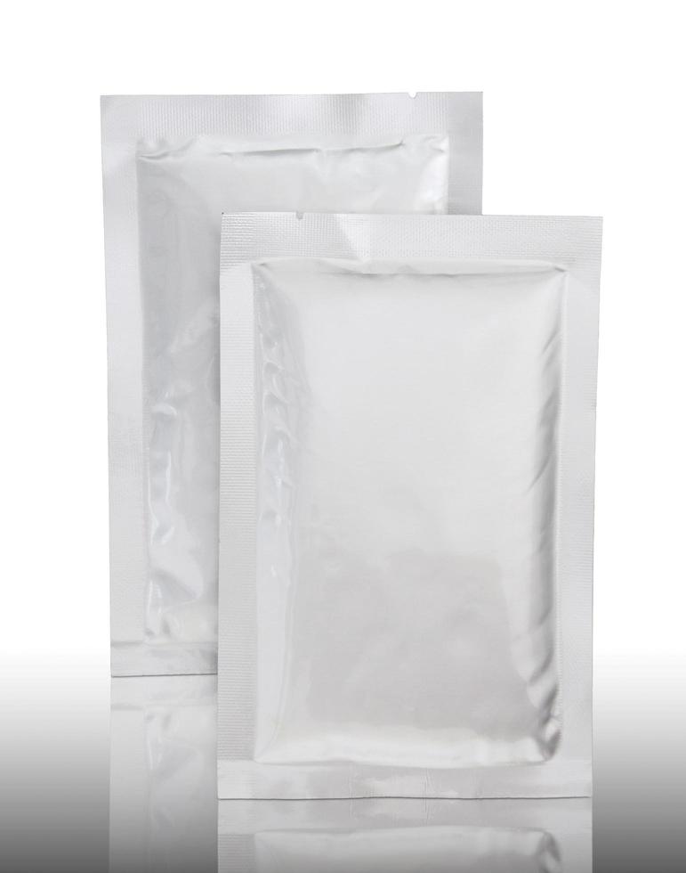 plastic package on reflect floor and white background photo