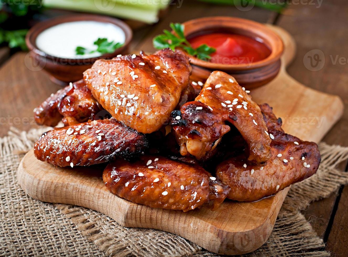 Baked chicken wings with teriyaki sauce photo