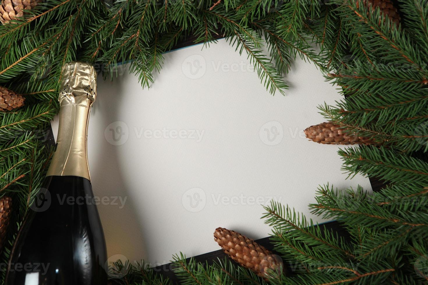 New Year's Eve background with fir branch and cones. Christmas and New Year holidays composition of pine tree branches. Happy New Year 2023 photo