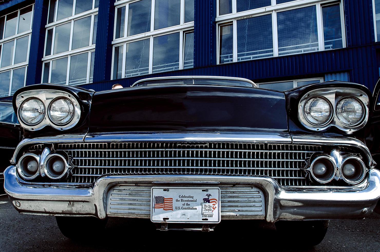 Color detail on the headlight of a vintage car photo