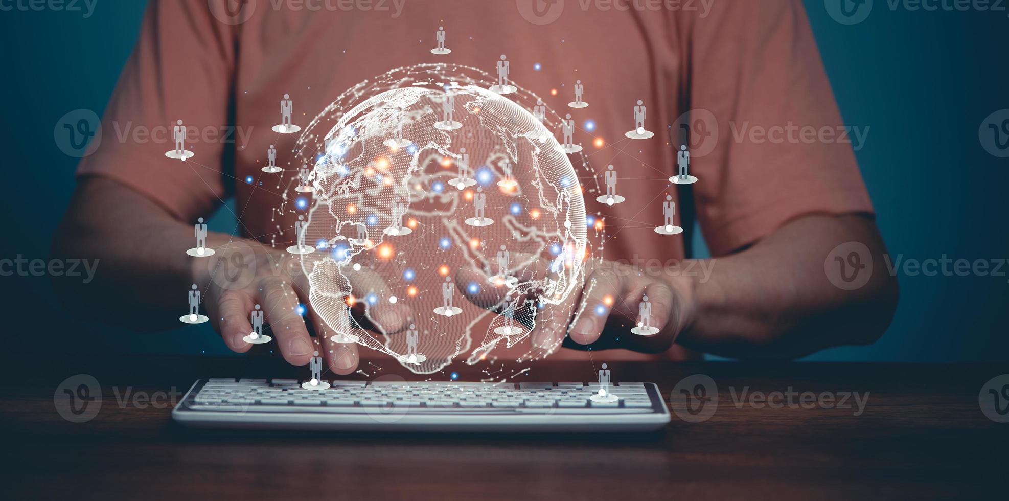 Man Using computer communication with other people on the global cyber space network technology  in the world. photo