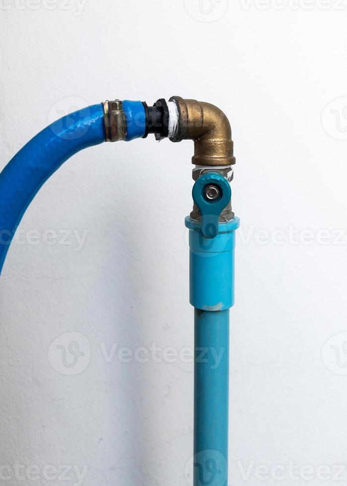 The small brass valve to control the flow of water. photo
