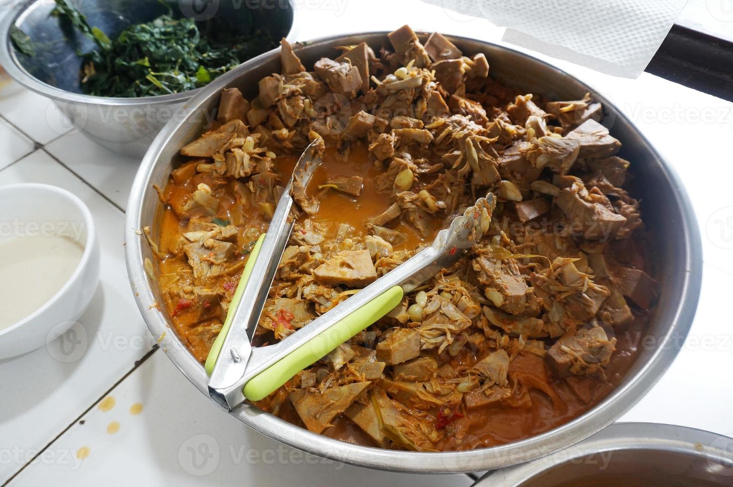 Gulai Nangka or jackfruit curry stew is an Indonesian traditional food from Padang, West Sumatera, Selective focus photo