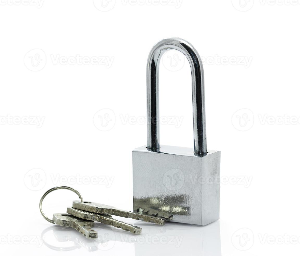 Padlock with three keys on white background photo