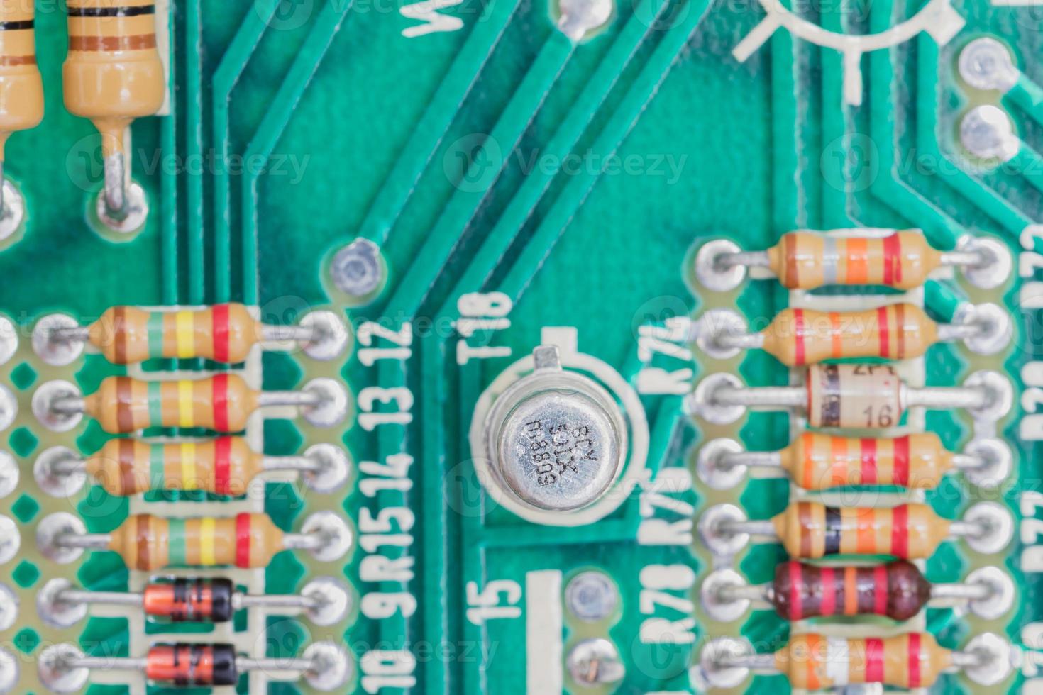 Condensers and Resistor assembly on the circuit board photo