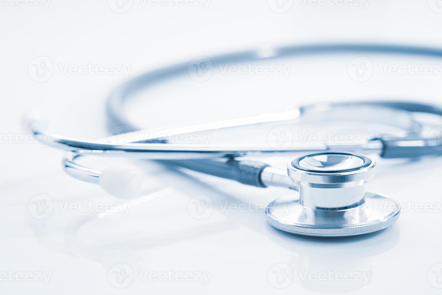 Stethoscope for doctor checkup on white photo