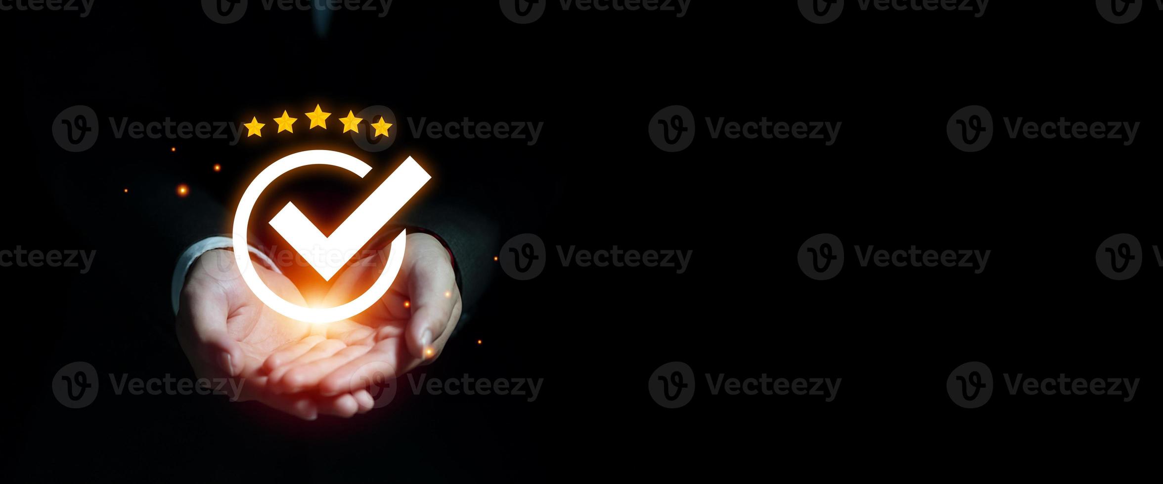 Businessman showing virtual guarantee ion with copy space banner, Standard quality control certification assurance guarantee concept. Hands giving the best quality of product and service to customer photo