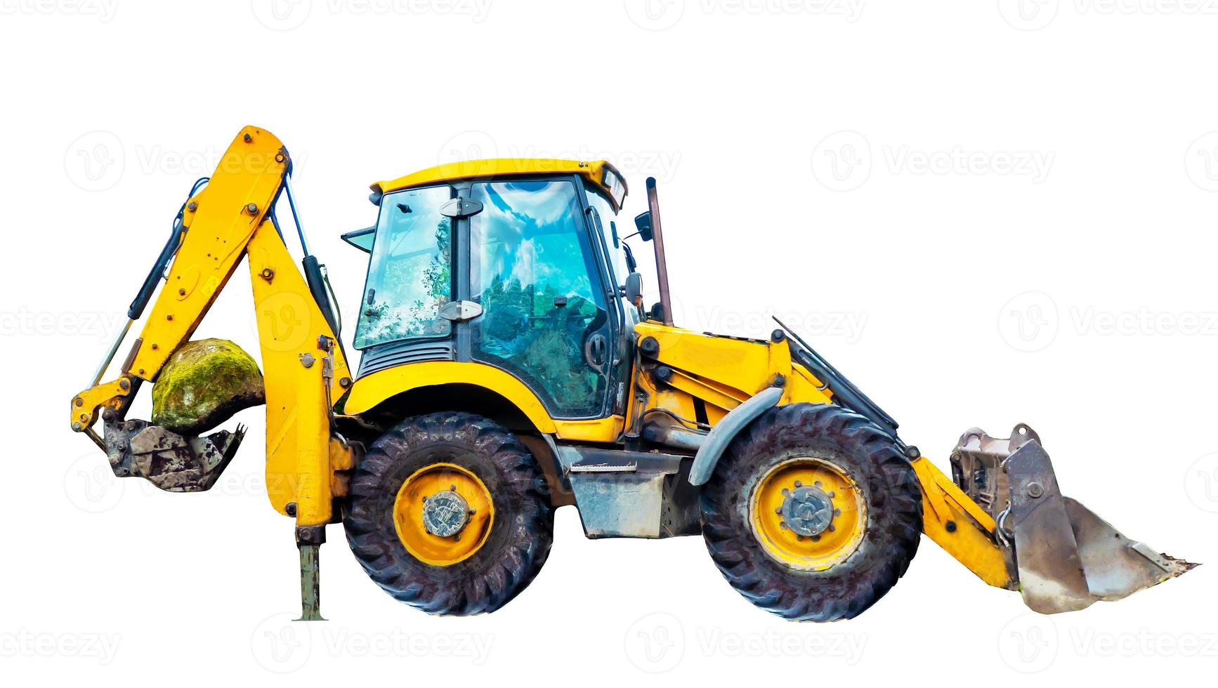 A large yellow multifunctional wheeled tractor isolated on white background. photo