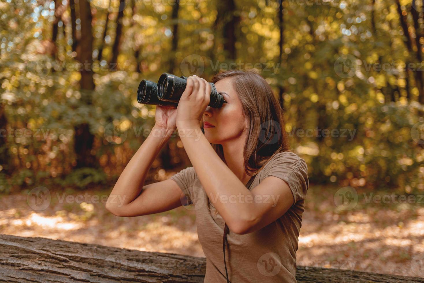 Girl With Binoculars photo