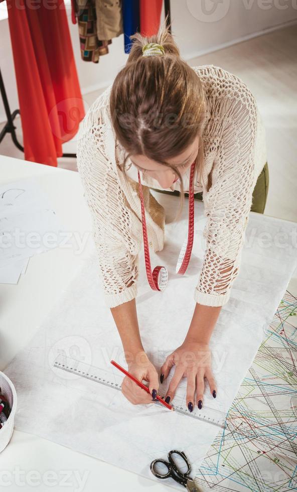 Woman Tailor With Sewing Pattern photo