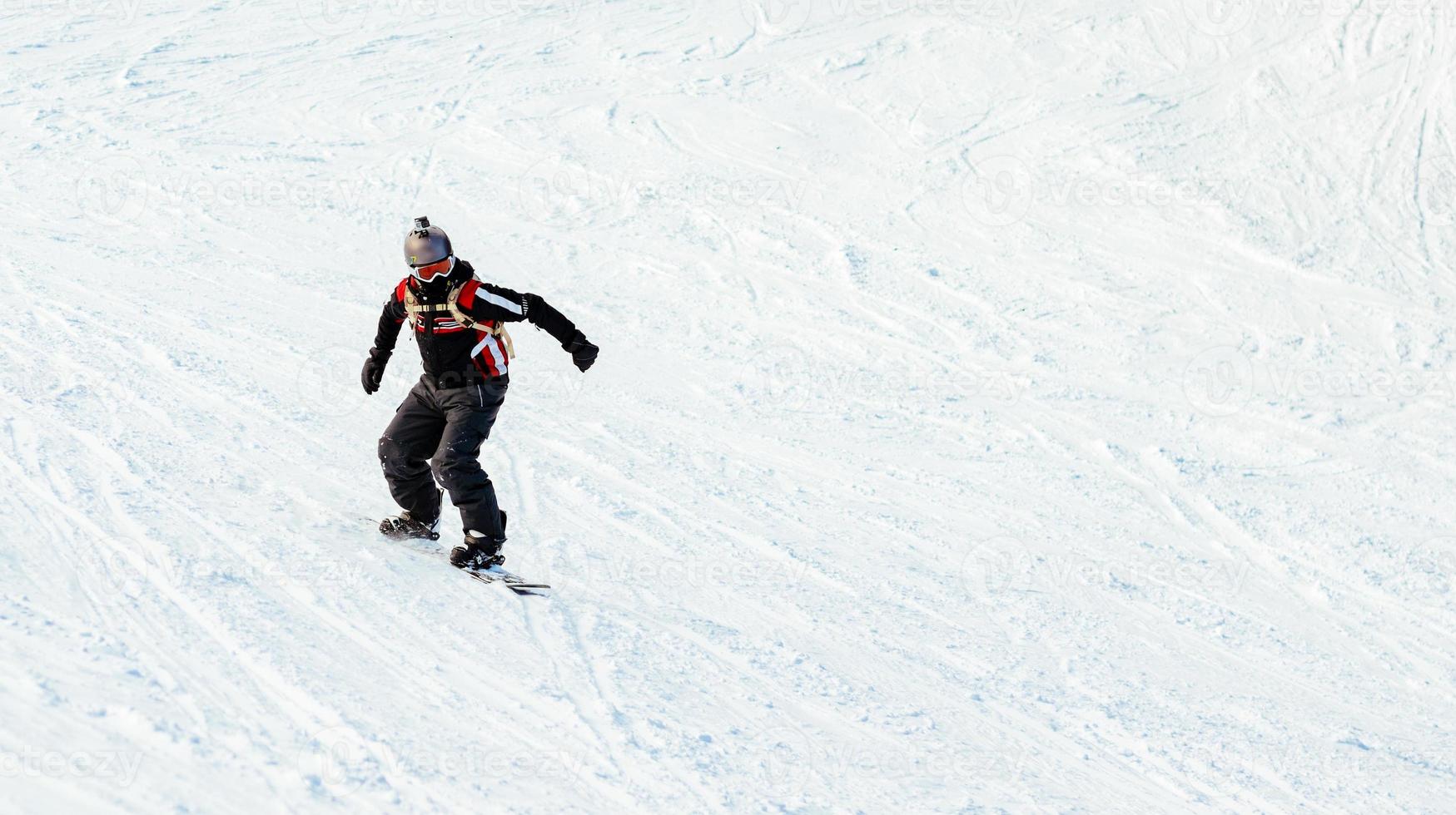 Snowboarder In Action photo