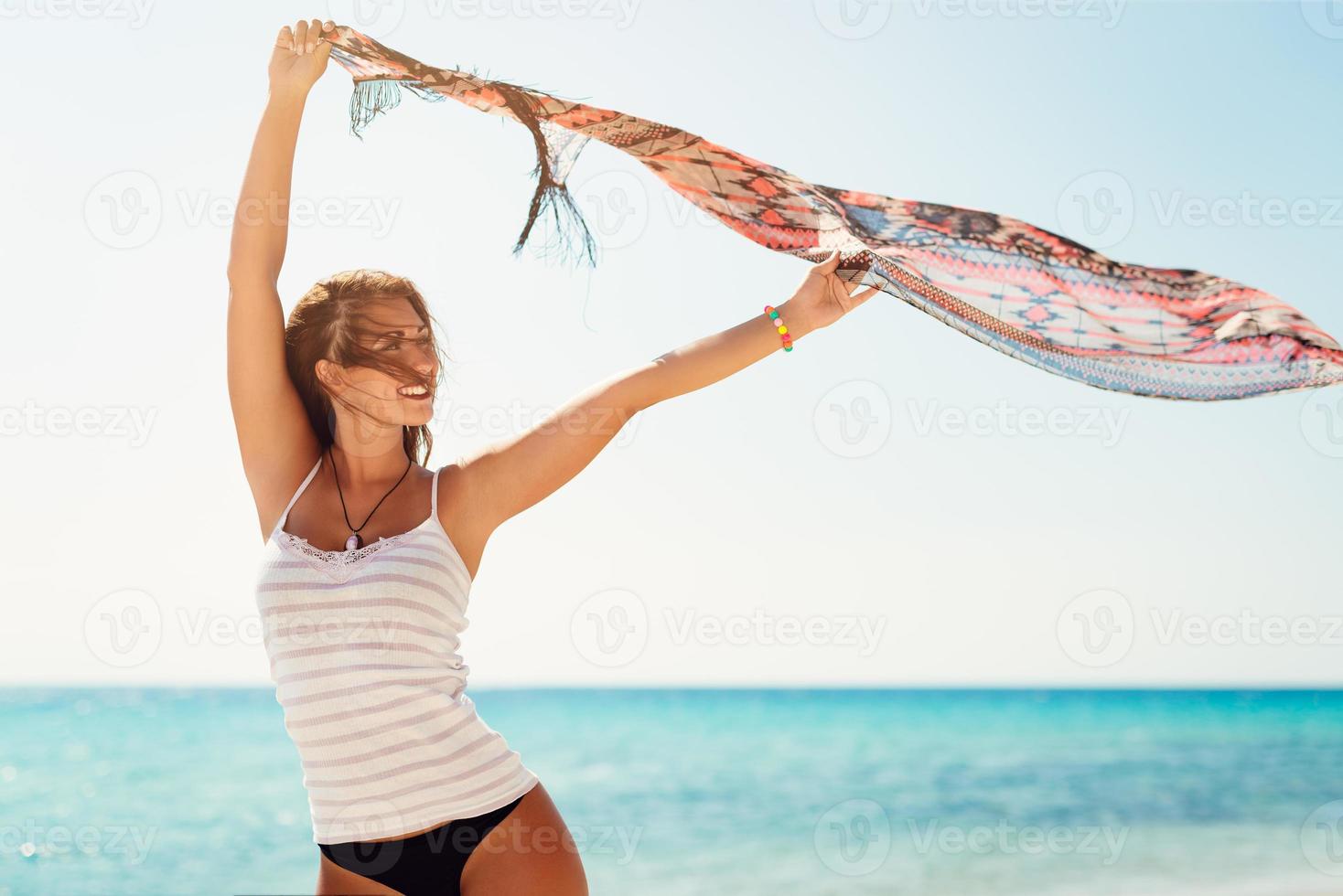 Girl Enjoying On The Beach photo