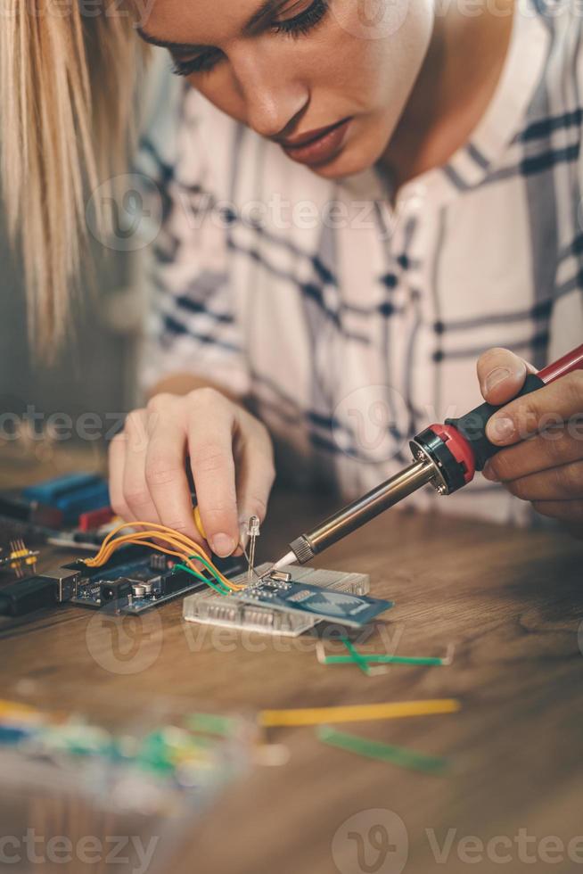 Soldering Electronic Circuit Board photo