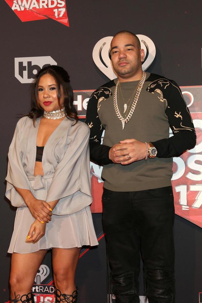 LOS ANGELES - MAR 5 - Angela Yee, DJ Envy at the 2017 iHeart Music Awards at Forum on March 5, 2017 in Los Angeles, CA photo