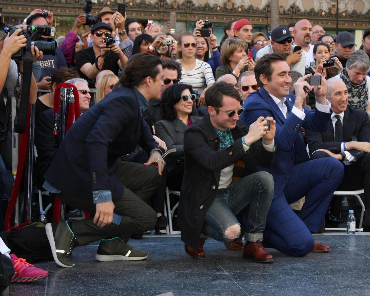 LOS ANGELES, DEC 8 - Orlando Bloom, Elijah Wood, Lee Pace at the Peter Jackson Hollywood Walk of Fame Ceremony at the Dolby Theater on December 8, 2014 in Los Angeles, CA photo