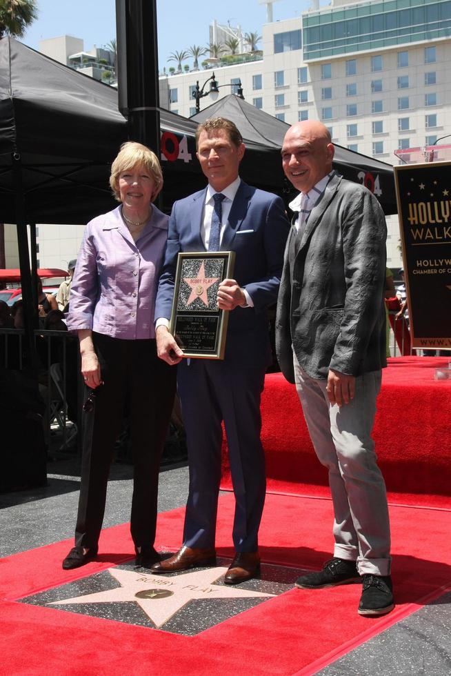 LOS ANGELES, JUN 2 - Brooke Johnson, Bobby Flay, Michael Symon at the Bobby Flay Hollywood Walk of Fame Ceremony at the Hollywood Blvd on June 2, 2015 in Los Angeles, CA photo