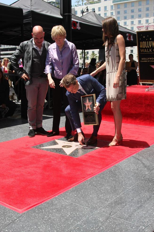 LOS ANGELES, JUN 2 - Michael Symon, Brooke Johnson, Bobby Flay, Sophie Flay at the Bobby Flay Hollywood Walk of Fame Ceremony at the Hollywood Blvd on June 2, 2015 in Los Angeles, CA photo