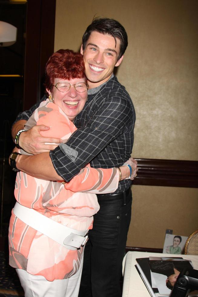 LOS ANGELES, AUG 27 - Angelique de Vries s mom, Adam Gregory attending the Bold and The Beautiful Fan Event 2011 at the Universal Sheraton Hotel on August 27, 2011 in Los Angeles, CA photo