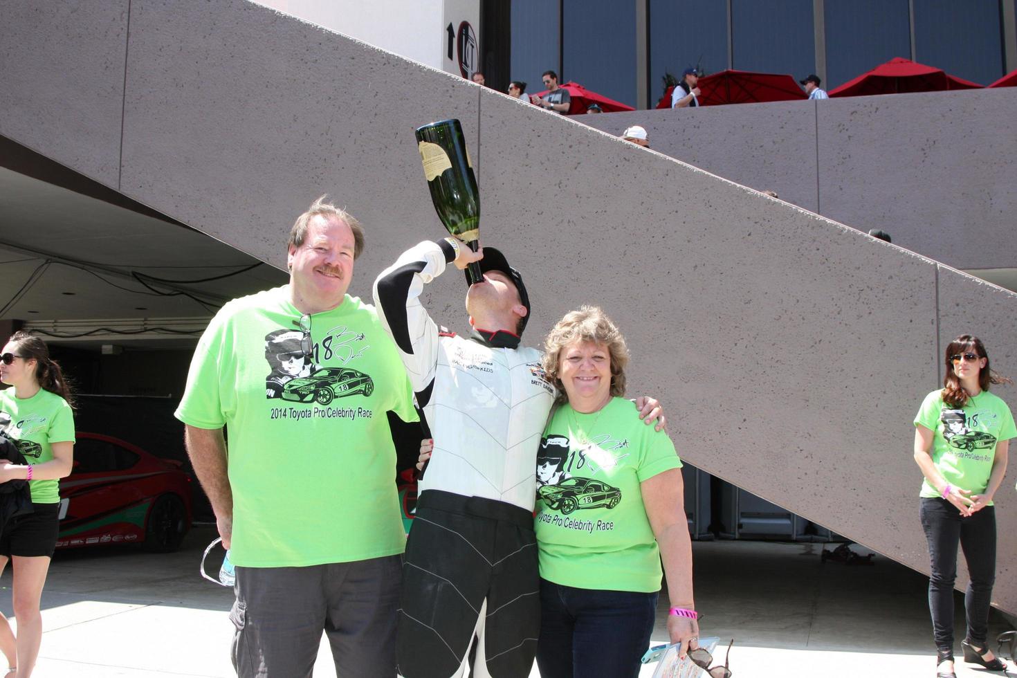LOS ANGELES, APR 12 - Brett Davern, Parents at the Long Beach Grand Prix Pro Celeb Race Day at the Long Beach Grand Prix Race Circuit on April 12, 2014 in Long Beach, CA photo
