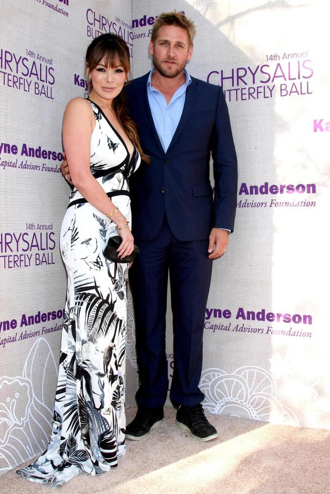 LOS ANGELES, JUN 6 - Lindsay Price, Curtis Stone at the 14th Annual Chrysalis Butterfly Ball at the Private Residence on June 6, 2015 in Los Angeles, CA photo