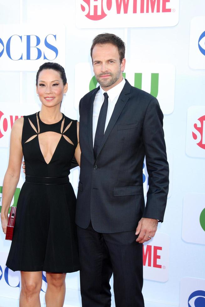 LOS ANGELES, JUL 29 - Lucy Liu, Jonny Lee Miller arrives at the CBS, CW, and Showtime 2012 Summer TCA party at Beverly Hilton Hotel Adjacent Parking Lot on July 29, 2012 in Beverly Hills, CA photo