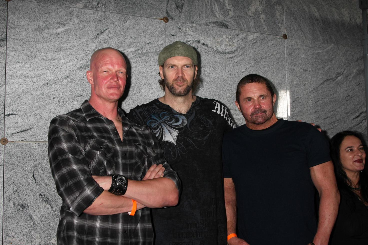 LOS ANGELES, SEP 15 - Derek Mears, Tyler Mane, Kane Hodder arrives at the Chillerama Premiere at Hollywood Forever Cemetary on September 15, 2011 in Los Angeles, CA photo