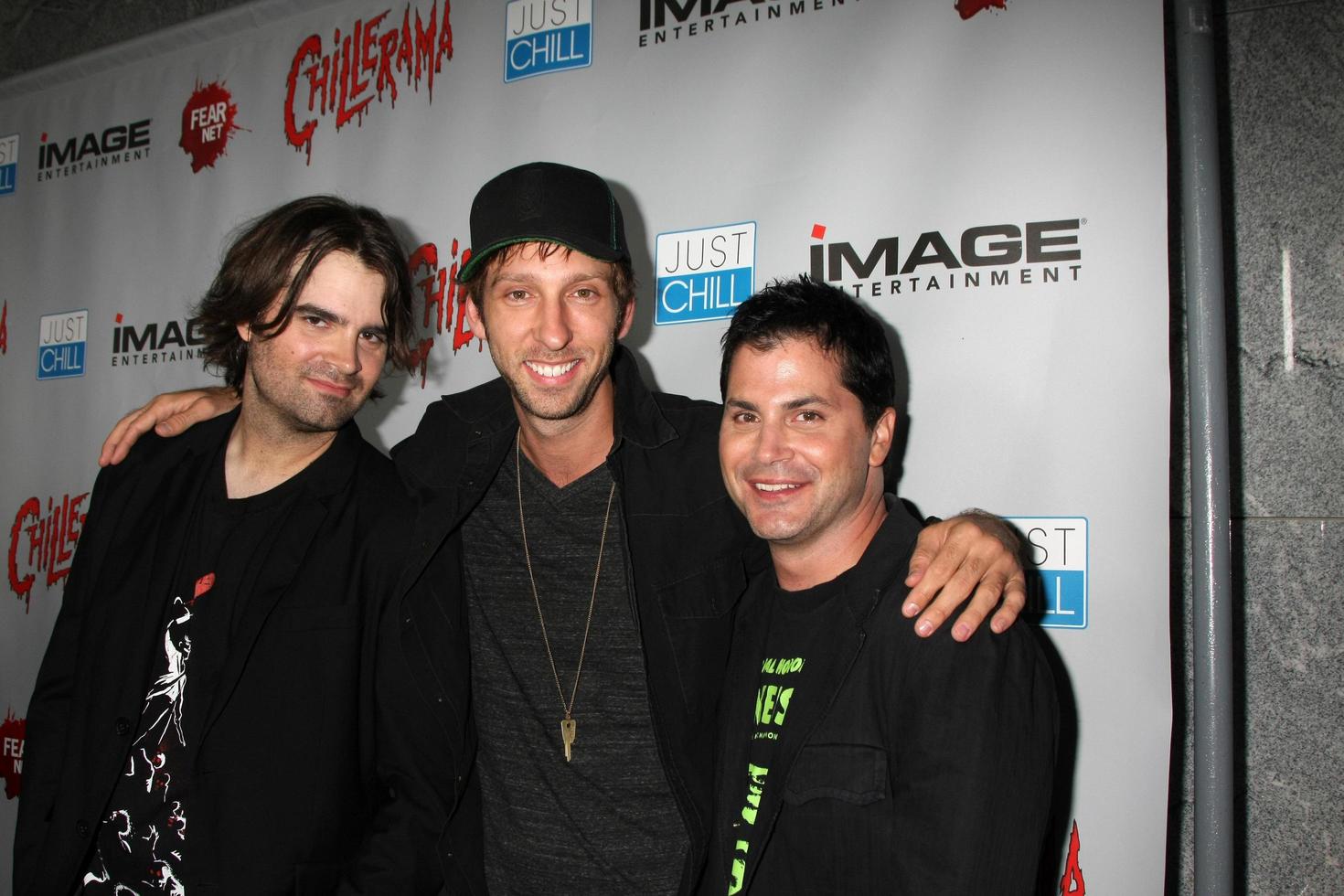 LOS ANGELES, SEP 15 - Joe Lynch, Joel David Moore, Adam Green arrives at the Chillerama Premiere at Hollywood Forever Cemetary on September 15, 2011 in Los Angeles, CA photo