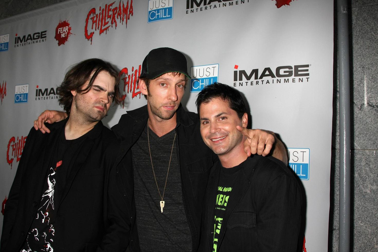 LOS ANGELES, SEP 15 - Joe Lynch, Joel David Moore, Adam Green arrives at the Chillerama Premiere at Hollywood Forever Cemetary on September 15, 2011 in Los Angeles, CA photo