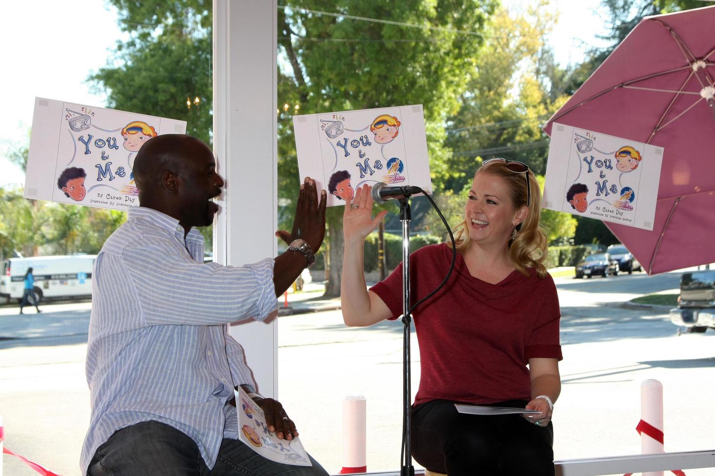 LOS ANGELES, NOV 5 - Alimi Ballard, Melissa Joan Hart at the YOU AND ME Book Party at SweetHarts on November 5, 2011 in Sherman Oaks, CA photo