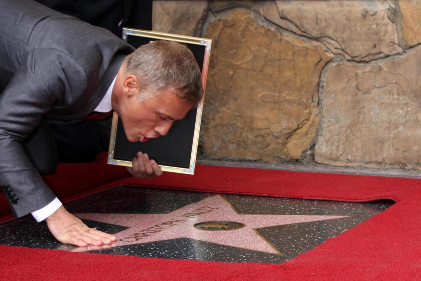 LOS ANGELES, DEC 1 - Christoph Waltz at the Christoph Waltz Hollywood Walk of Fame Star Ceremony at the Hollywood Boulevard on December 1, 2014 in Los Angeles, CA photo