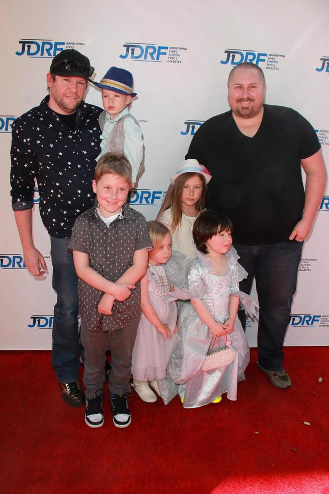 LOS ANGELES, MAR 8 - Bill Horn, Scout Masterson, thier son, Spelling-McDermott kids at the Disney s Cinderella Advance Screening at the Disney Studios on March 8, 2015 in Burbank, CA photo