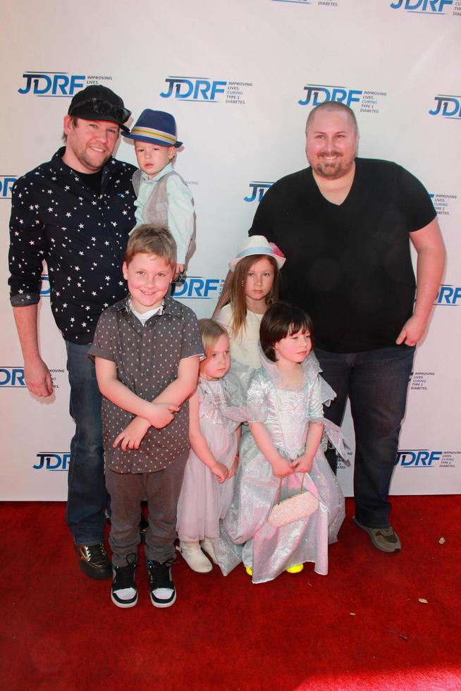 LOS ANGELES, MAR 8 - Bill Horn, Scout Masterson, thier son, Spelling-McDermott kids at the Disney s Cinderella Advance Screening at the Disney Studios on March 8, 2015 in Burbank, CA photo