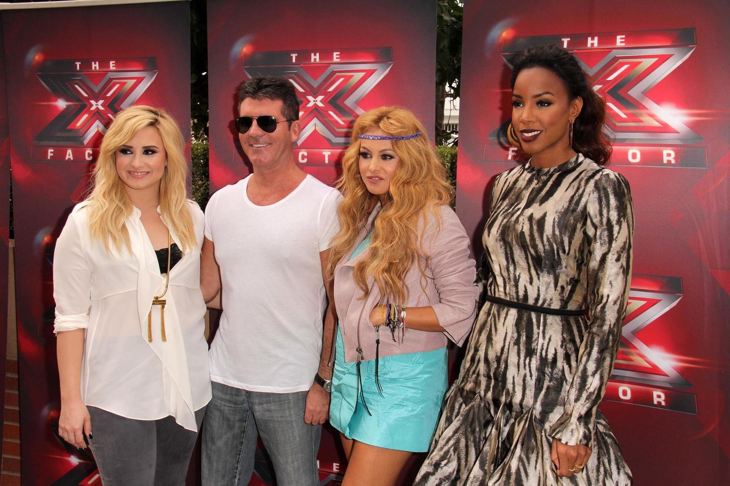 LOS ANGELES, JUL 11 - Demi Lovato, Simon Cowell, Paulina Rubio, Kelly Rowland at the X-Factor Season 3 Photo Call at the Galen Center on July 11, 2013 in Los Angeles, CA