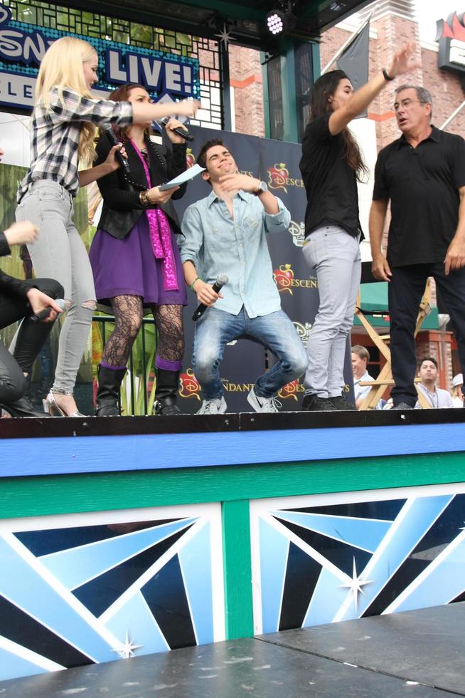LOS ANGELES, OCT 17 - Dove Cameron, Cameron Boyce, Booboo Stewart, Kenny Ortega at the Stars of Descendants Personal Appearance at the Downtown Disney on October 17, 2015 in Anaheim, CA photo