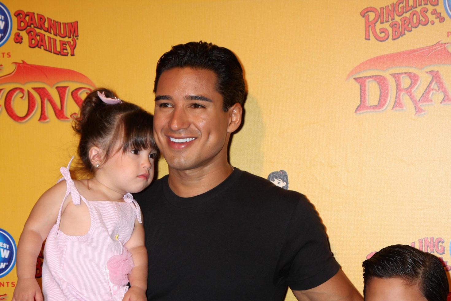 LOS ANGELES, JUL 12 - Mario Lopez and daughter arrives at Dragons presented by Ringling Bros and Barnum and Bailey Circus at Staples Center on July 12, 2012 in Los Angeles, CA photo