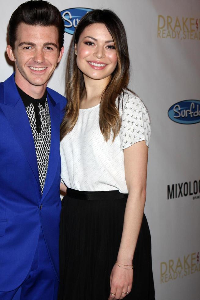 LOS ANGELES, APR 17 - Drake Bell, Miranda Cosgrove at the Drake Bell s Album Release Party for Ready, Set, Go at Mixology on April 17, 2014 in Los Angeles, CA photo