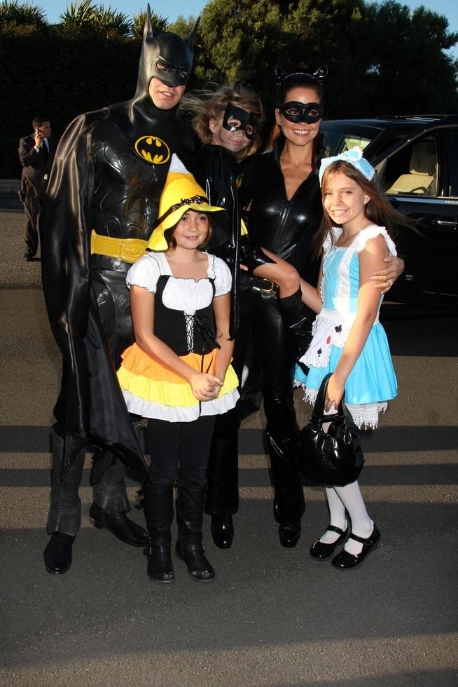 LOS ANGELES, OCT 30 - David Charvet, Brooke Burke, children arrives at the 17th Annual Dream Halloween benefiting CAAF at Barker Hanger on October 30, 2010 in Santa Monica, CA photo