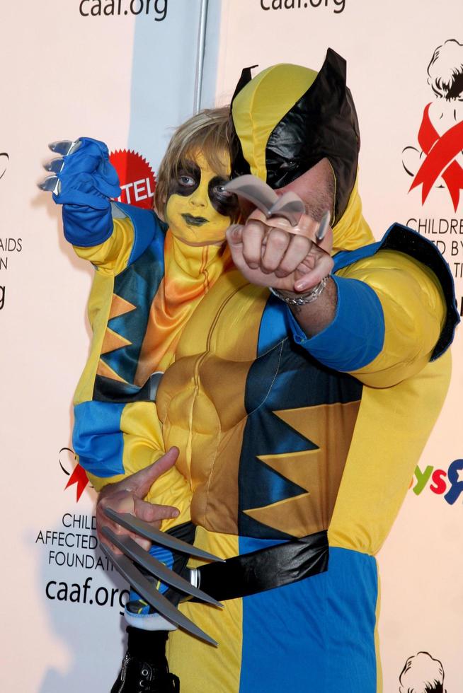 LOS ANGELES, OCT 30 - Dean MCDermott, son Liam arrives at the 17th Annual Dream Halloween benefiting CAAF at Barker Hanger on October 30, 2010 in Santa Monica, CA photo