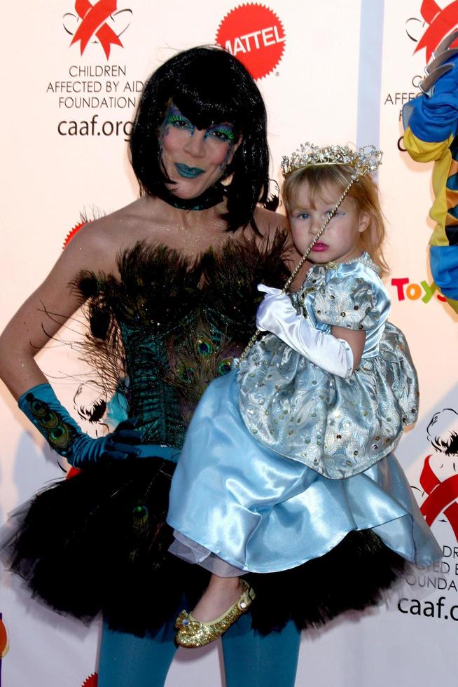 LOS ANGELES, OCT 30 - Tori Spelling, daugher Stella arrives at the 17th Annual Dream Halloween benefiting CAAF at Barker Hanger on October 30, 2010 in Santa Monica, CA photo