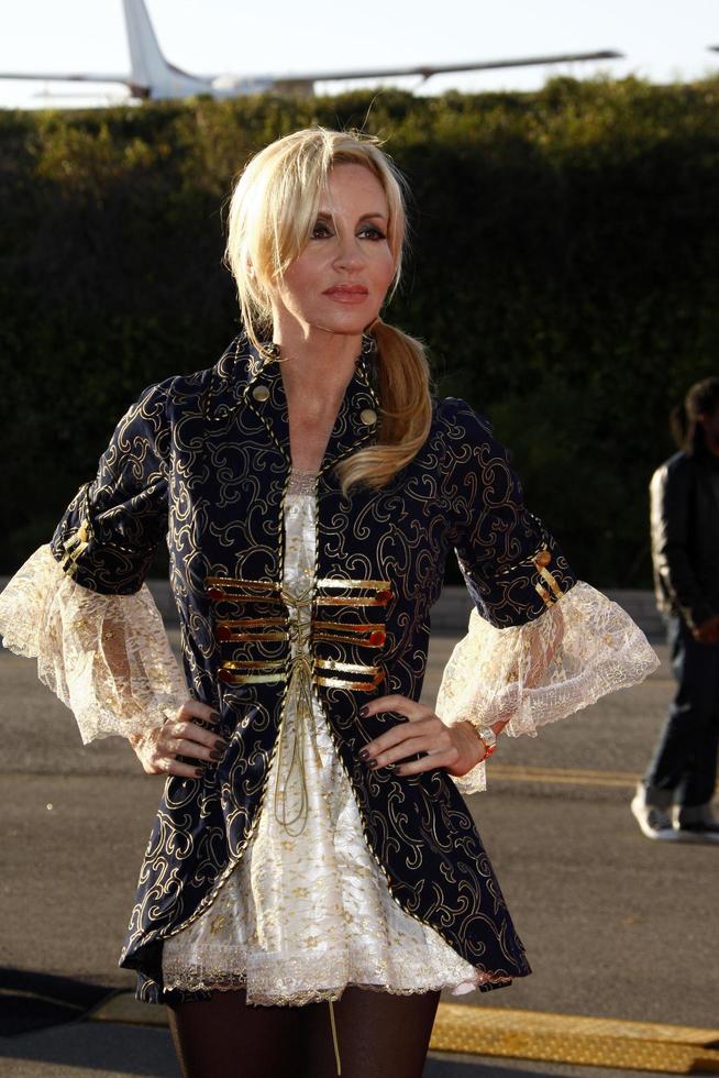 LOS ANGELES, OCT 29 - Camille Grammer arriving at the 18th Annual Dream Halloween Los Angeles at Barker Hanger on October 29, 2011 in Santa Monica, CA photo
