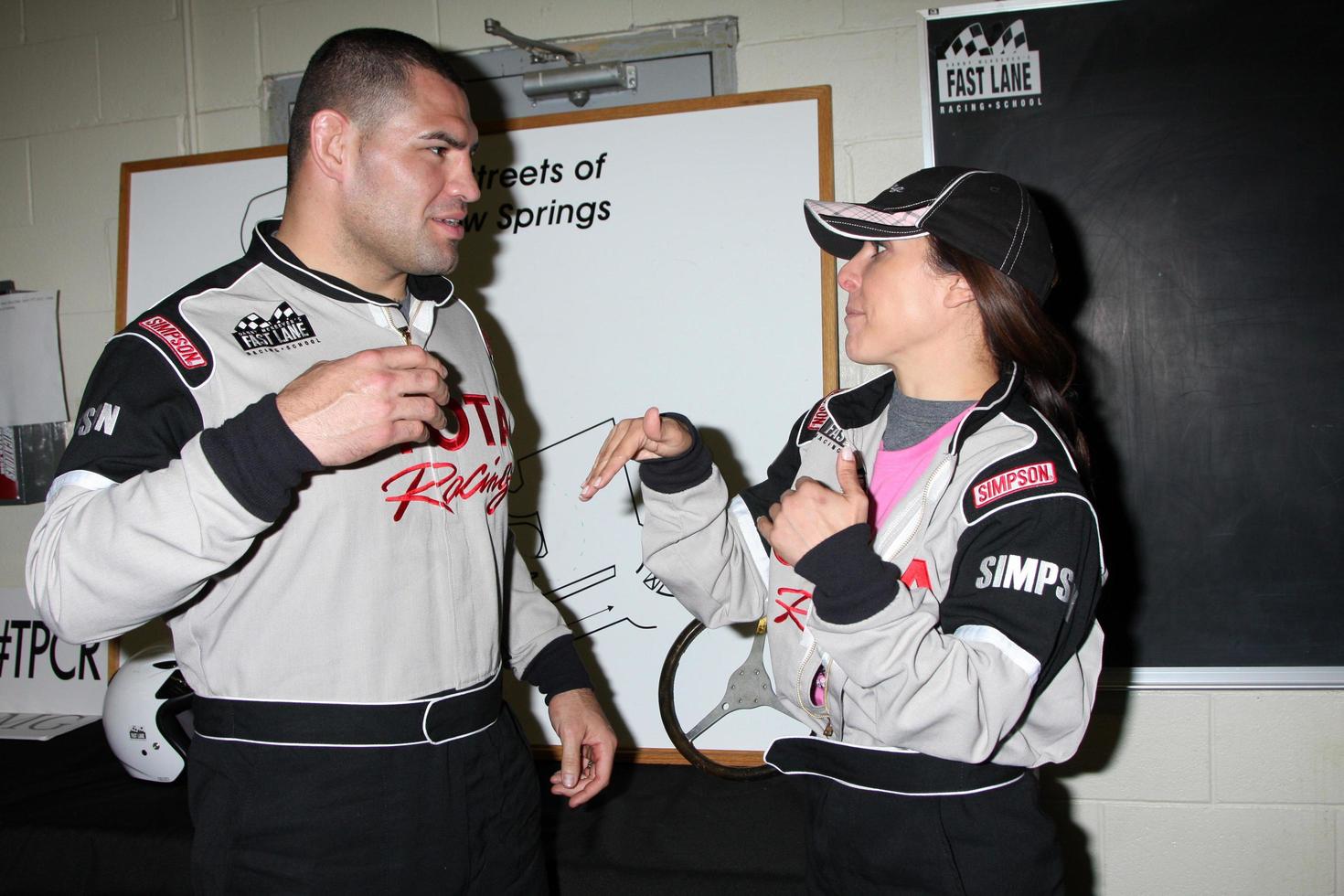 LOS ANGELES, MAR 17 - Cain Velasquez Kate del Castillo at the training session for the 36th Toyota Pro Celebrity Race to be held in Long Beach, CA on April 14, 2012 at the Willow Springs Racetrack on March 17, 2012 in Willow Springs, CA photo