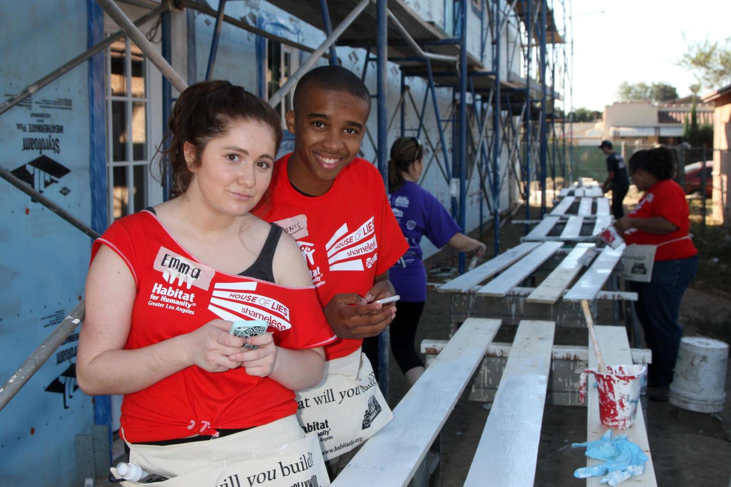 LOS ANGELES, OCT 25 - Emma Kenney, Donis Leonard Jr at the Habitat for Humanity build by Showtime s House of Lies and Shameless at Magnolia Blvd on October 25, 2014 in Lynwood, CA photo
