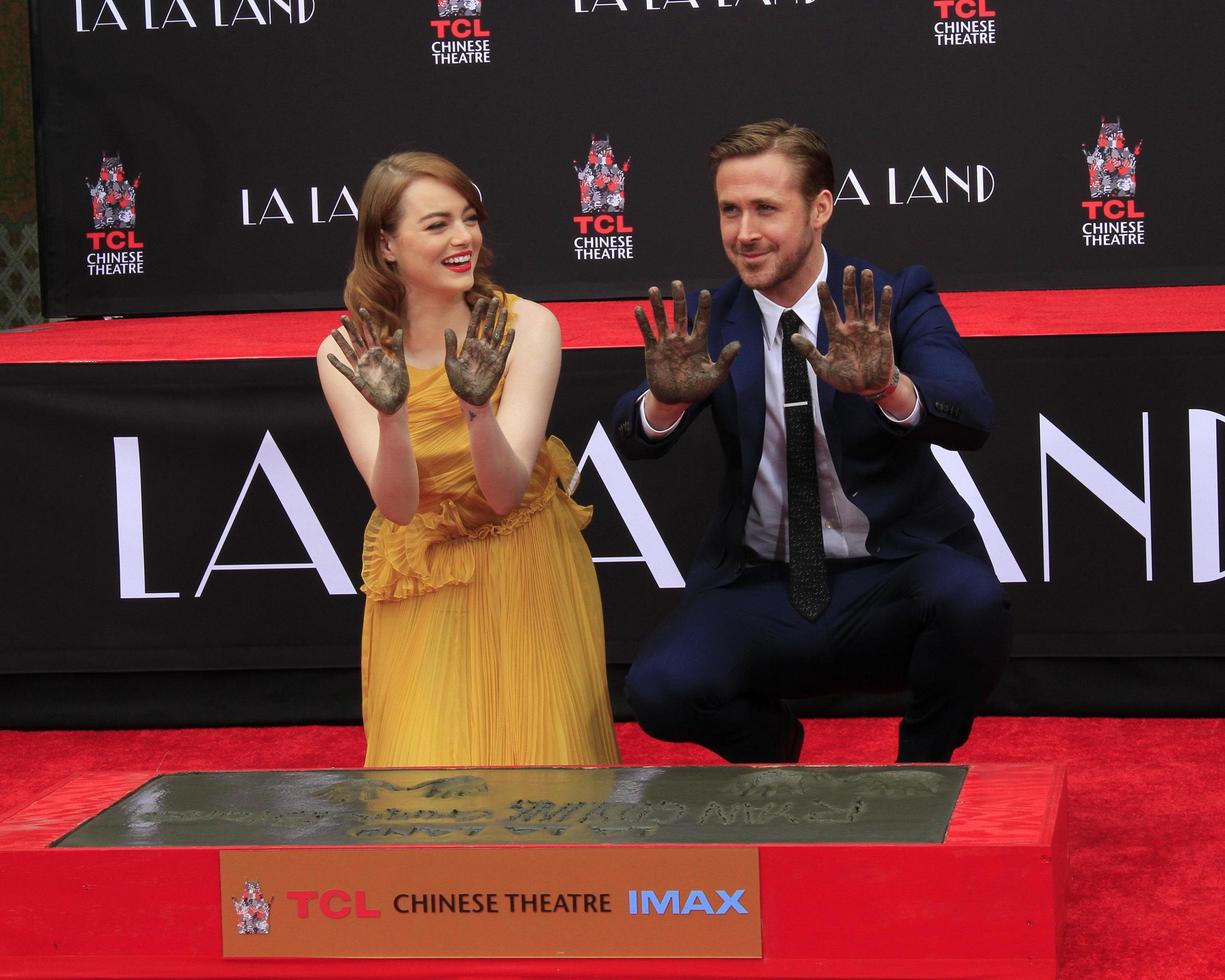 LOS ANGELES, DEC 7 - Emma Stone, Ryan Gosling at the Emma Stone and Ryan Gosling Hand and Foot Print Ceremony at TCL Chinese Theater on December 7, 2016 in Los Angeles, CA photo