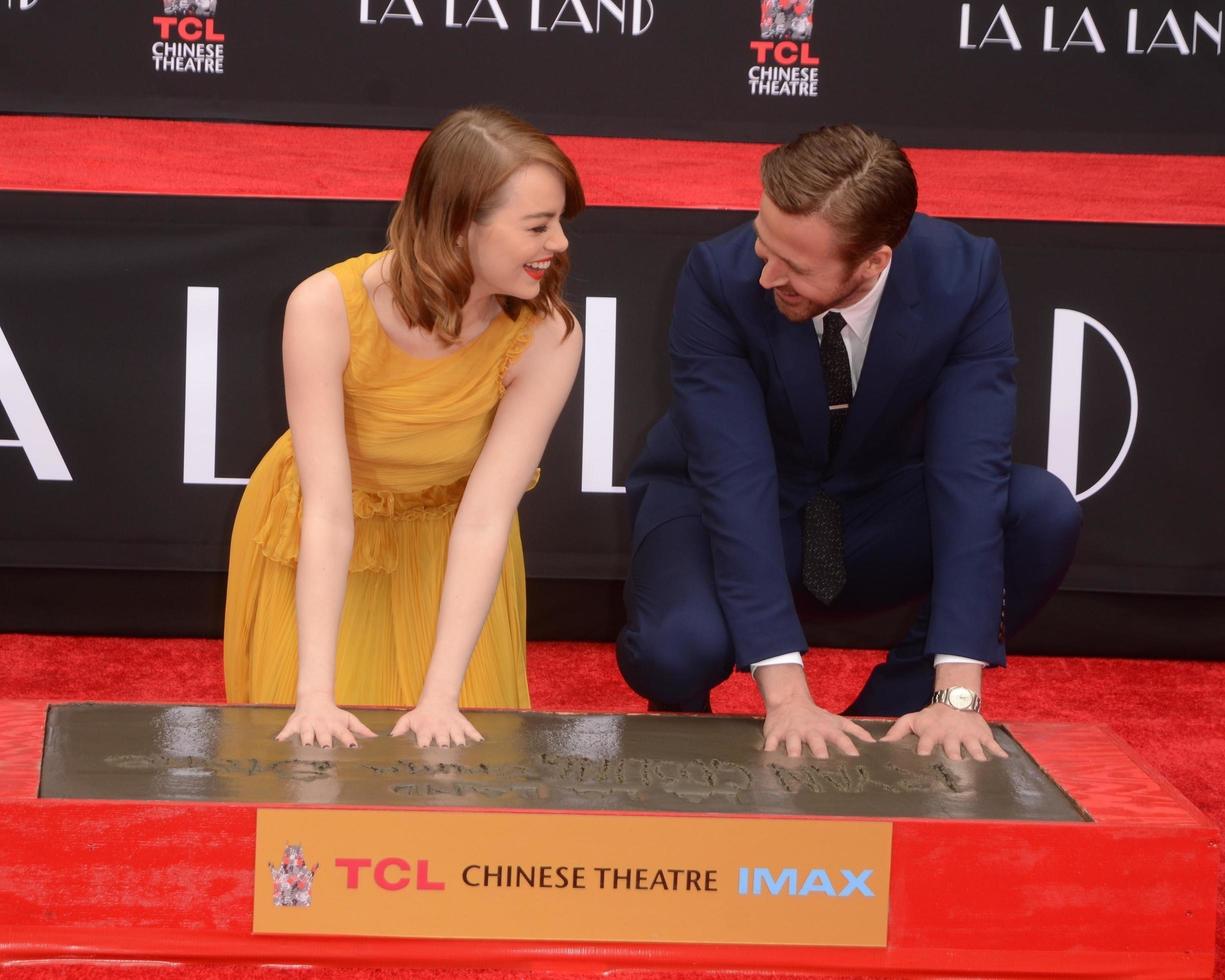 LOS ANGELES, DEC 7 - Emma Stone, Ryan Gosling at the Emma Stone and Ryan Gosling Hand and Foot Print Ceremony at TCL Chinese Theater on December 7, 2016 in Los Angeles, CA photo