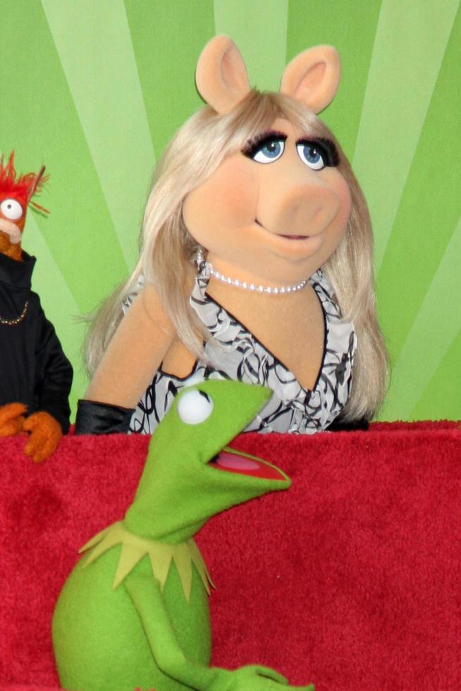 LOS ANGELES, MAR 20 - Miss Piggy, Kermit at the Hollywood Walk of Fame Star Ceremony for The Muppets at the El Capitan Theater on March 20, 2012 in Los Angeles, CA photo