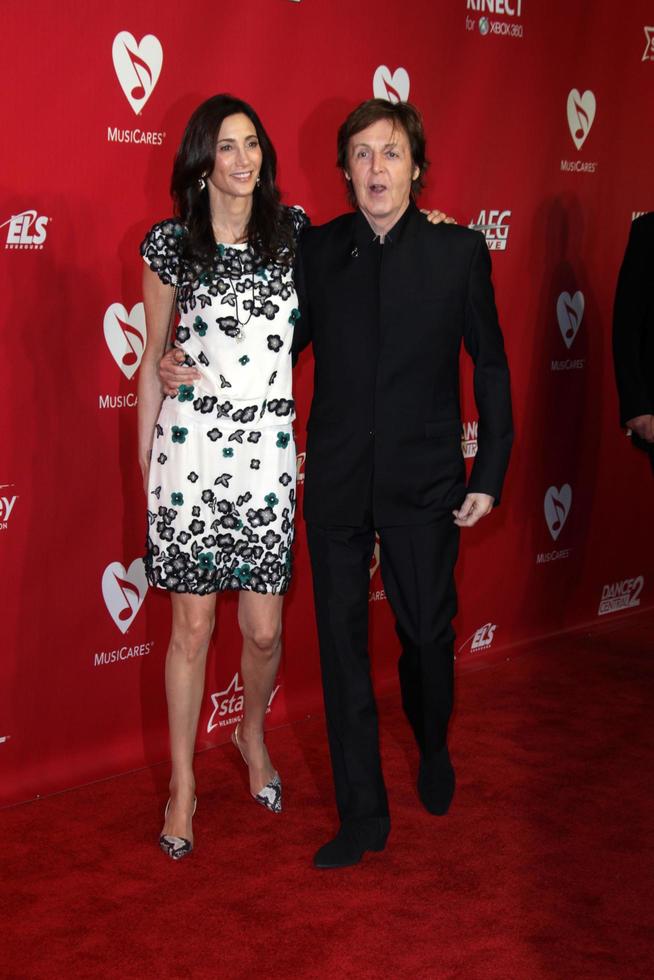 vLOS ANGELES, FEB 10 - Nancy Shevell, Paul McCartney arrives at the 2012 MusiCares Gala honoring Paul McCartney at LA Convention Center on February 10, 2012 in Los Angeles, CA photo