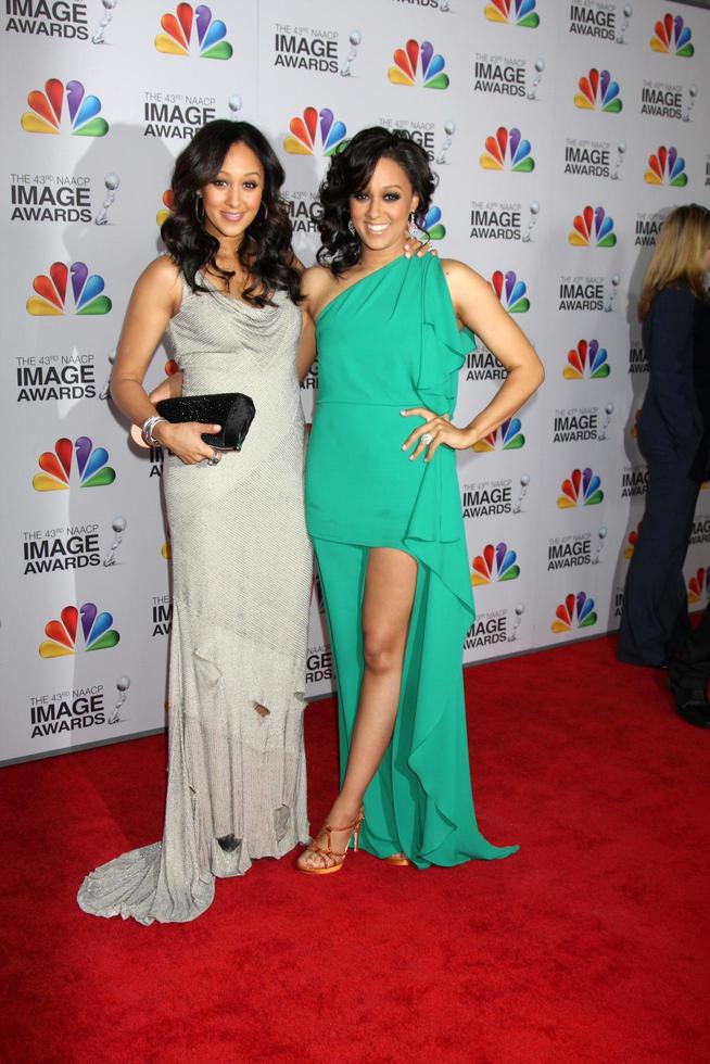 LOS ANGELES, FEB 17 - Tamera Mowry-Housley Tia Mowry Hardrict arrives at the 43rd NAACP Image Awards at the Shrine Auditorium on February 17, 2012 in Los Angeles, CA photo