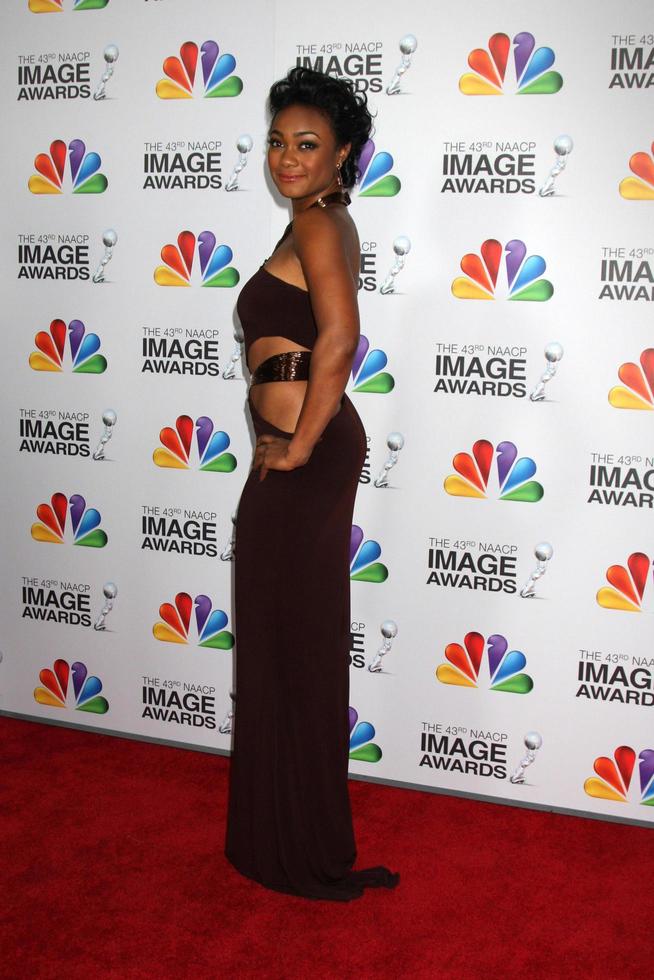 LOS ANGELES, FEB 17 - Tatyana Ali arrives at the 43rd NAACP Image Awards at the Shrine Auditorium on February 17, 2012 in Los Angeles, CA photo